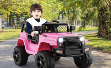 Child in Costway ride-on car.