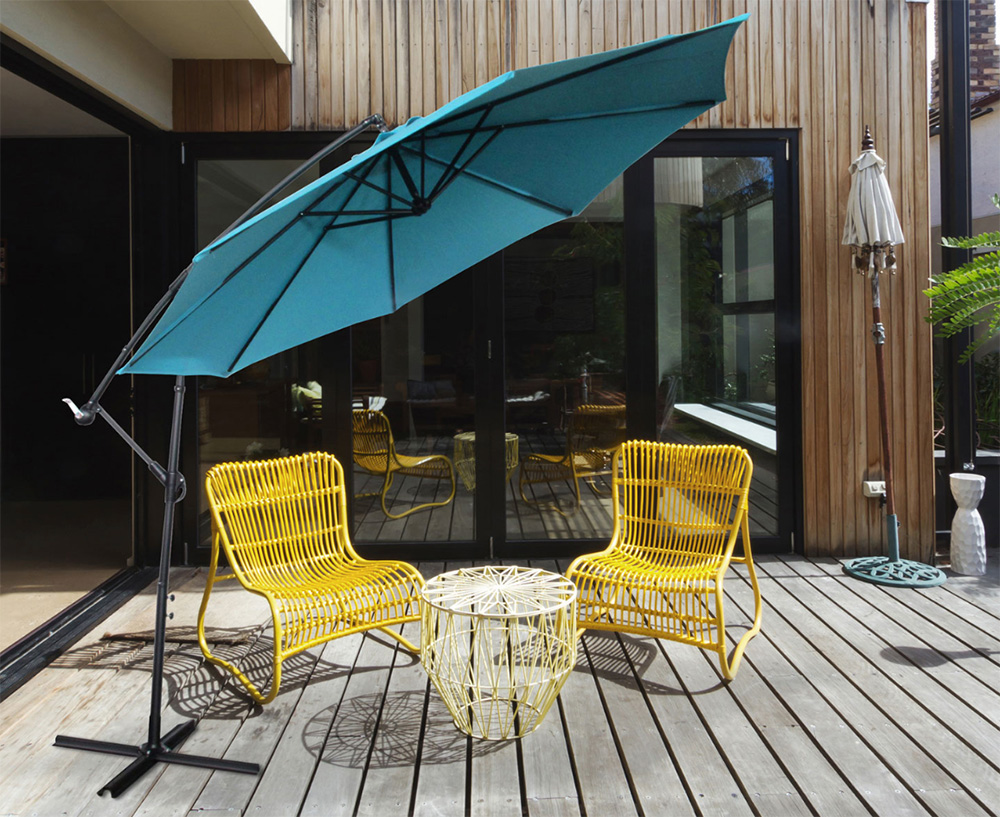 Umbrella set up on a patio to create shade and stay cool during the summer. 