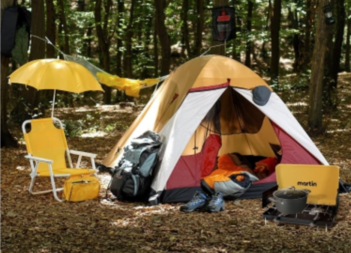 Martin MCS-200 2 burner in front of a tent and camping chair. 