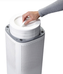 Clorox air purifier with filter being pulled out of the top.