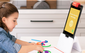 Kid playing with educational toy