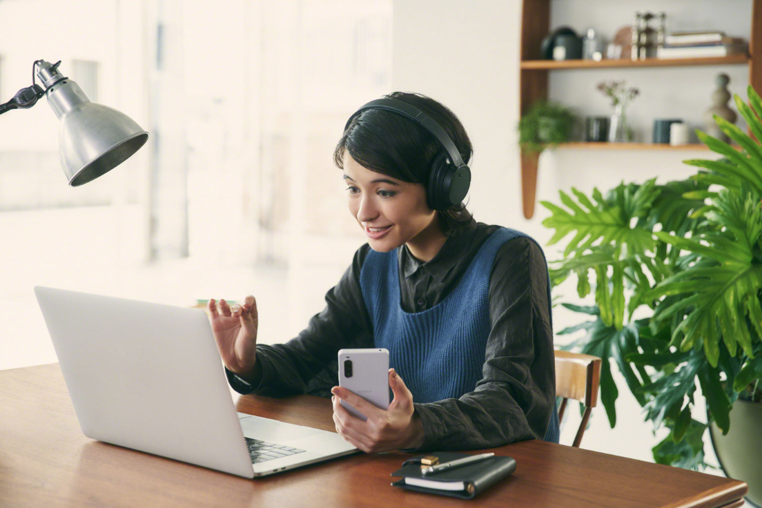 Woman wearing Sony headphones