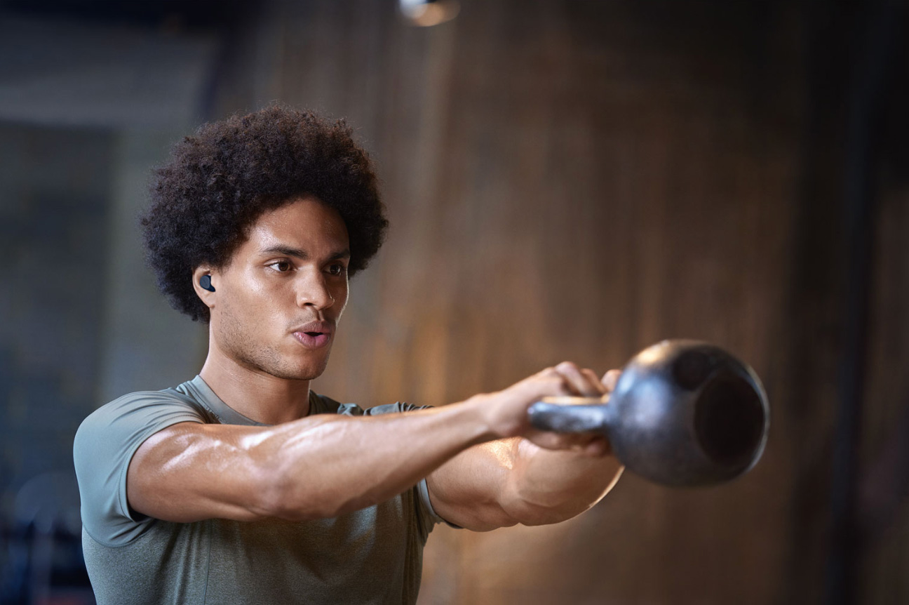Man working out with headphones.