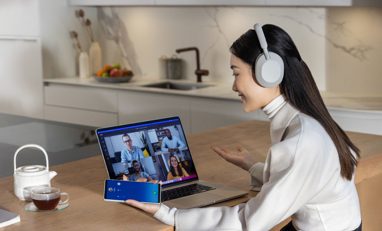 woman working with wireless headphones