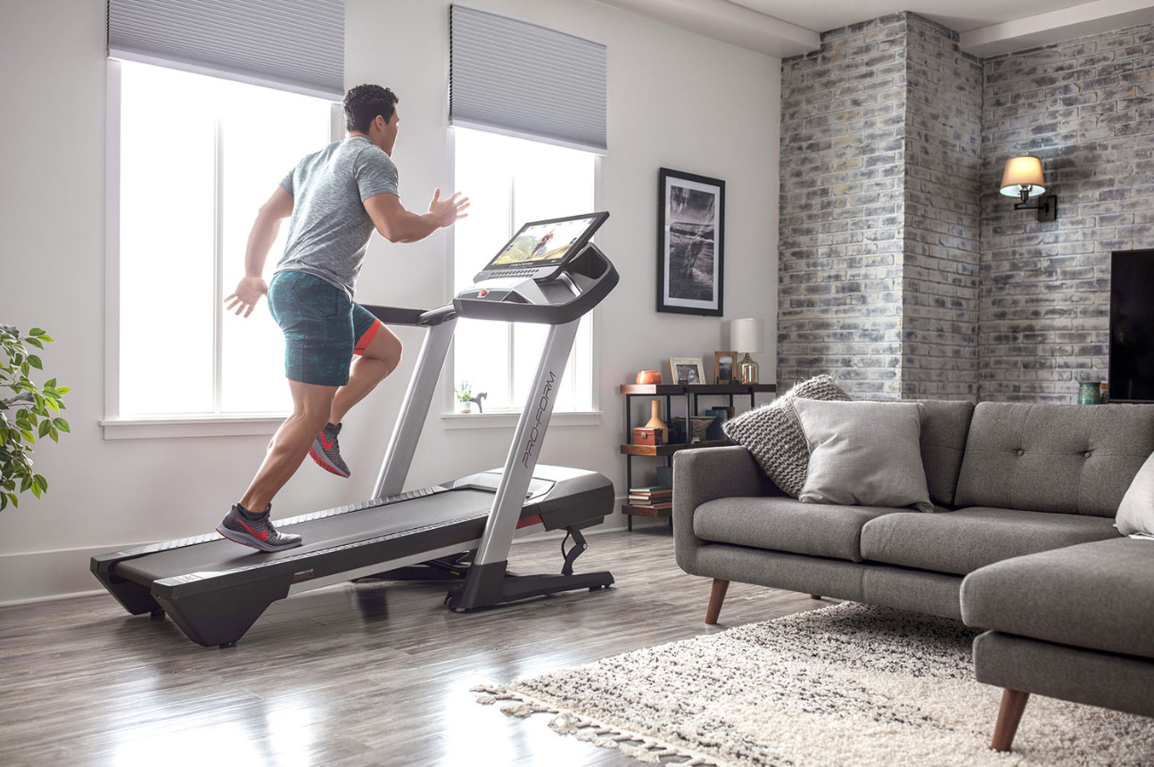 Man running on treadmill.