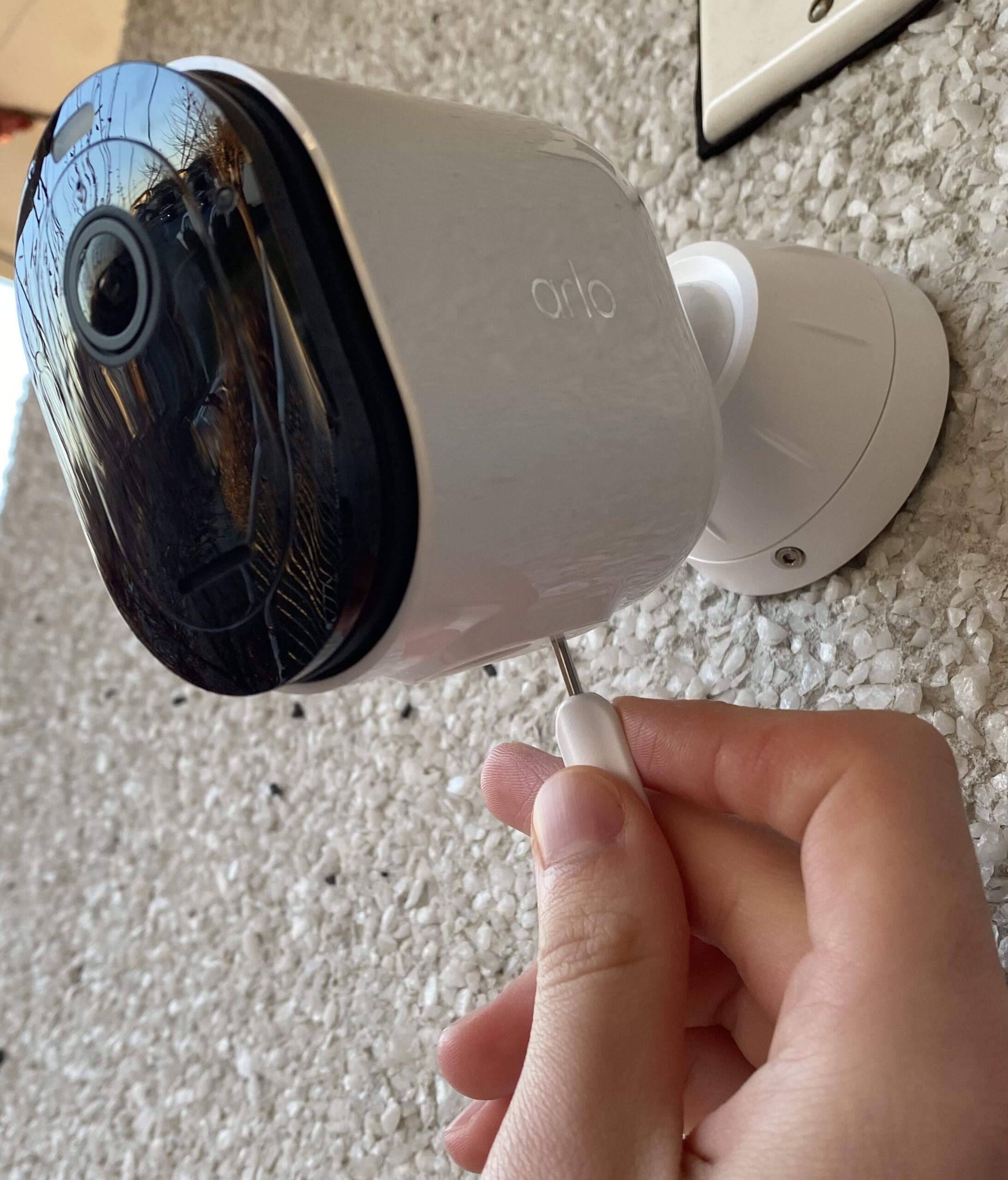 Using the Arlo Security key to swap out the battery of a wall mounted outdoor Pro 5S camera