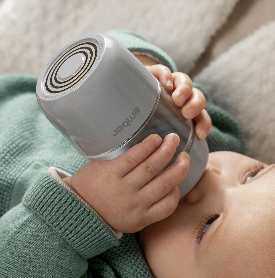 Baby with the What comes with the Ember Baby Bottle Feeding System