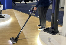 Tineco rep vacuuming.