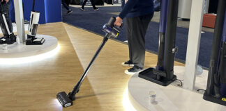 Tineco rep vacuuming.