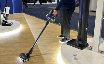 Tineco rep vacuuming.