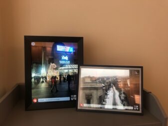 Two Aluratek digital photo frames side by side. 