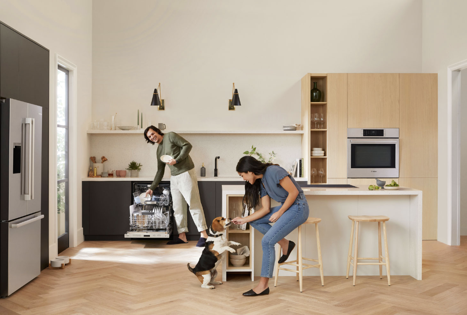Family in kitchen with Bosch dishwasher