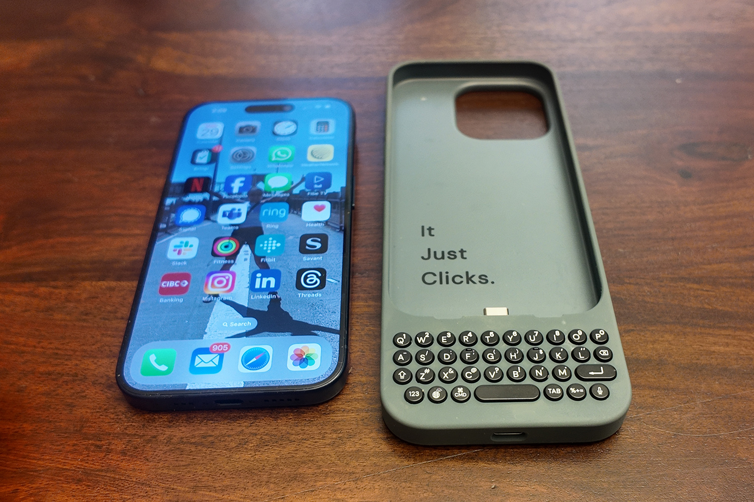 Clicks Keyboard Case beside iPhone