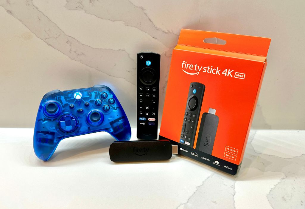 An Xbox Controller, Amazon Fire TV Stick and its packaging.