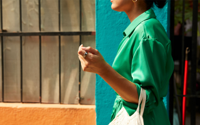 Woman wearing an Oura ring