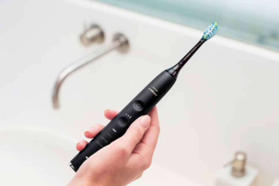 Philips Sonicare DiamondClean electric toothbrush in hand