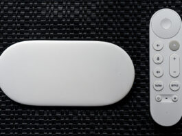 Google TV Streamer box next to remote.