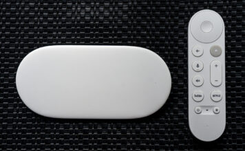 Google TV Streamer box next to remote.