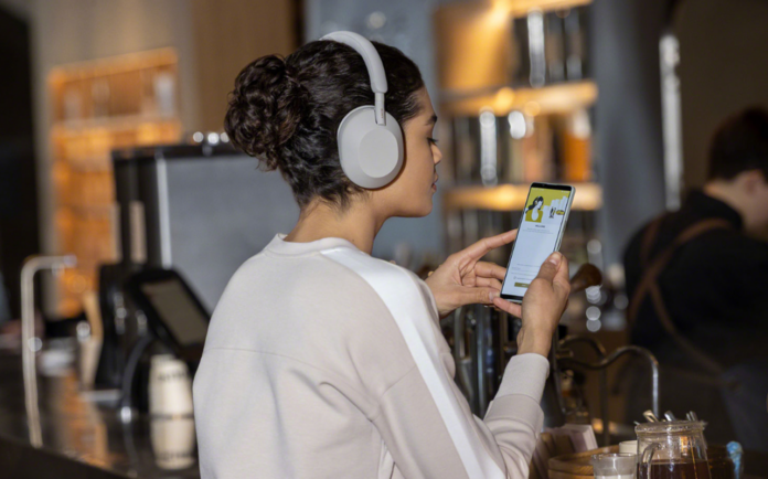 Woman wearing noise cancelling headphones