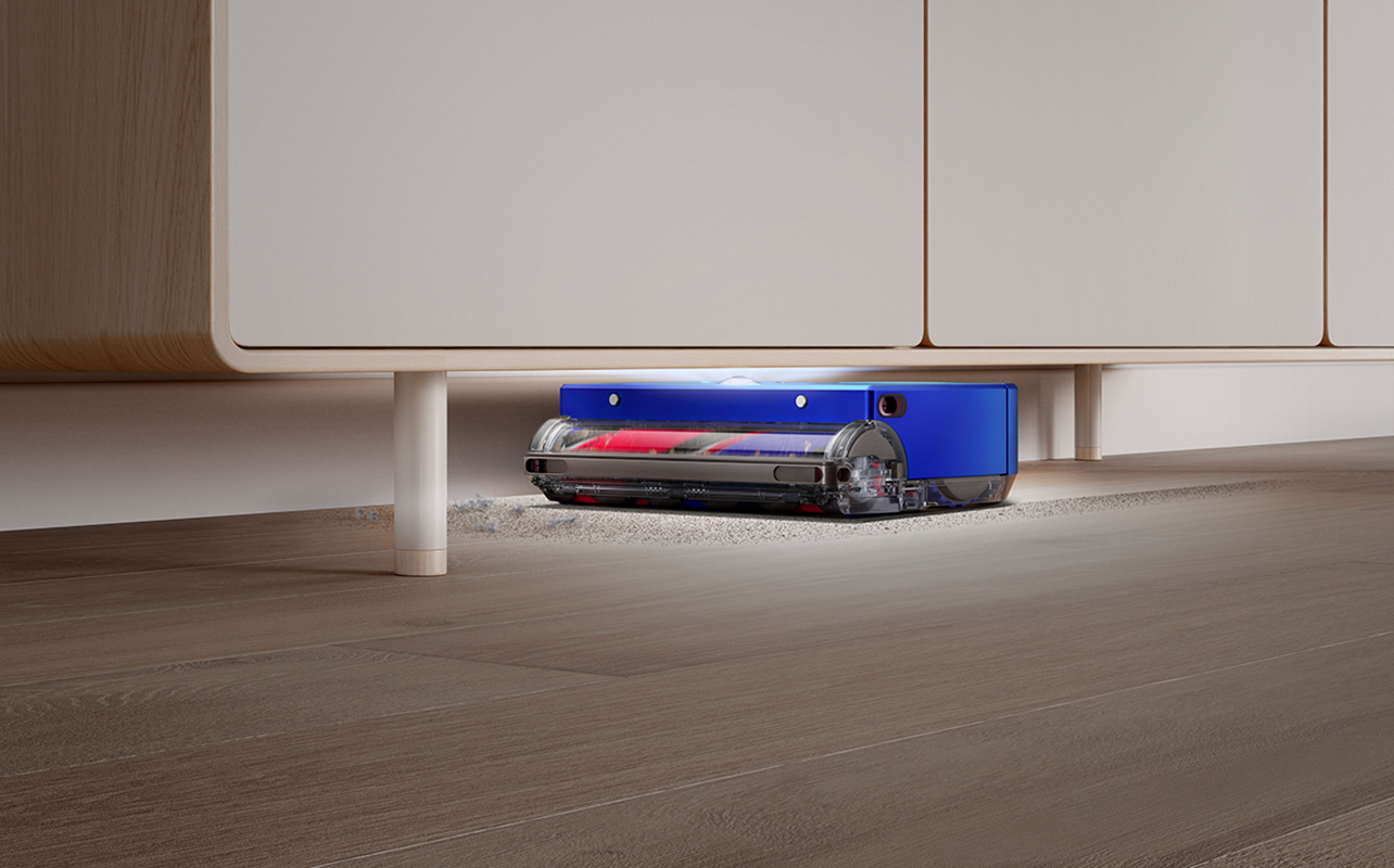 Aspirateur robot Vis Nav de Dyson sous un meuble