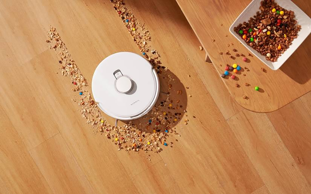 Narwal Freo Ultra robot vacuum with a cereal mess