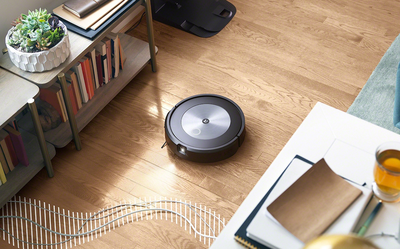 Roomba j7+ robot vacuum in a living room