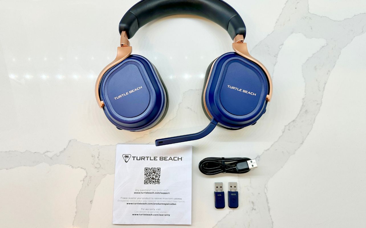 The Turtle Beach Stealth 700 and all box components laid out on a well-lit white countertop