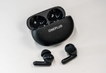 OnePlu sNord Buds 3 Pro earbuds loose in front of open case.