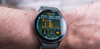 Samsung Galaxy Watch7 home screen on left wrist.