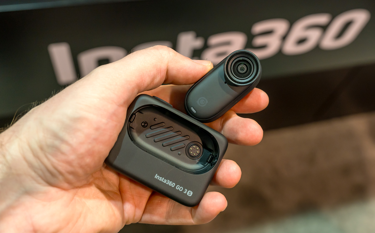 Insta360 Go 3S in hand separating camera from body at CES 2025.