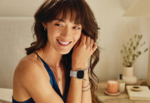 a woman wearing a smartwatch.