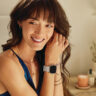 a woman wearing a smartwatch.