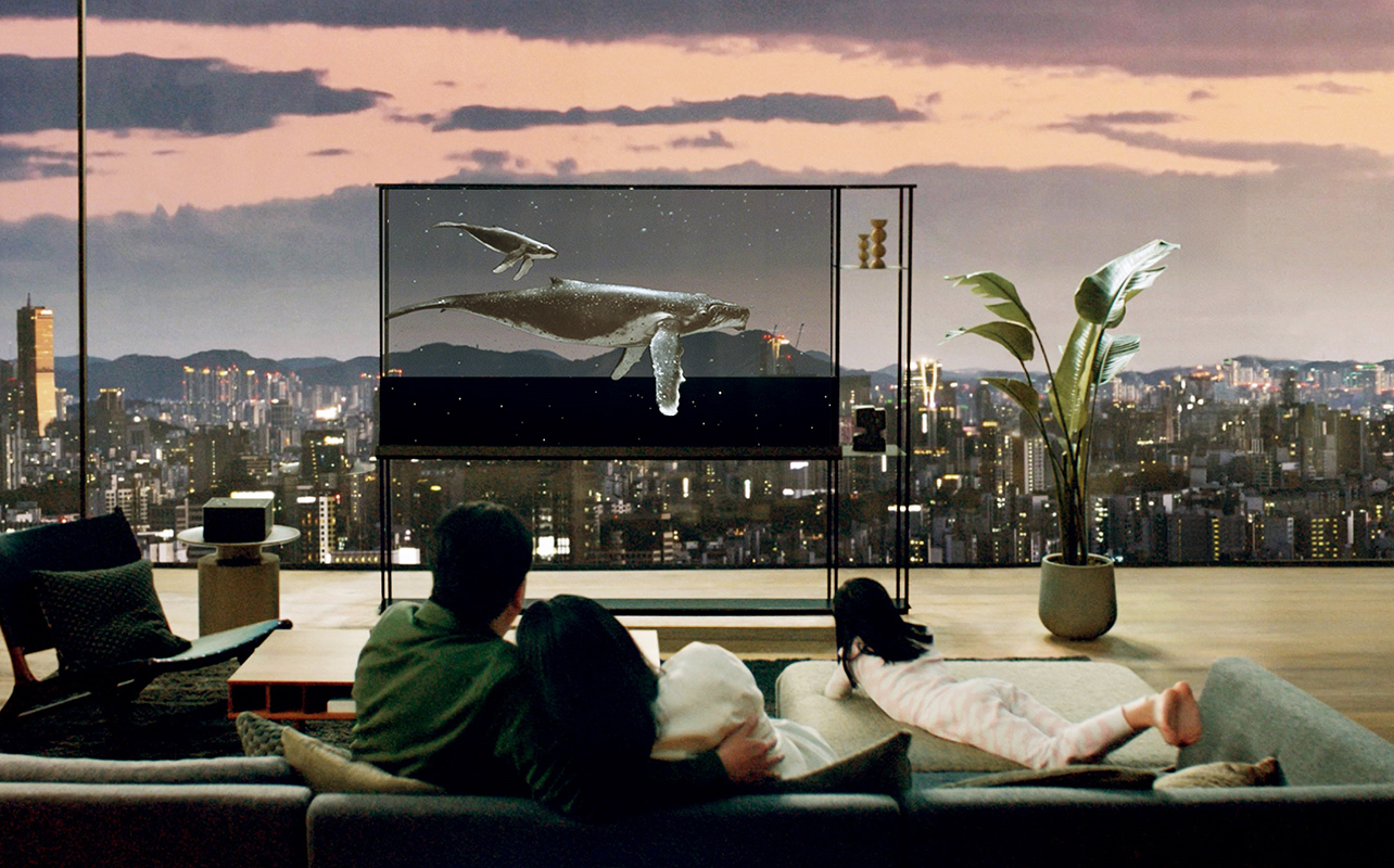 A family views an image of whale on the LG Signature OLED T