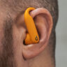 Close-up view of Beats by Dr. Dre Powerbeats Pro 2 in left ear.