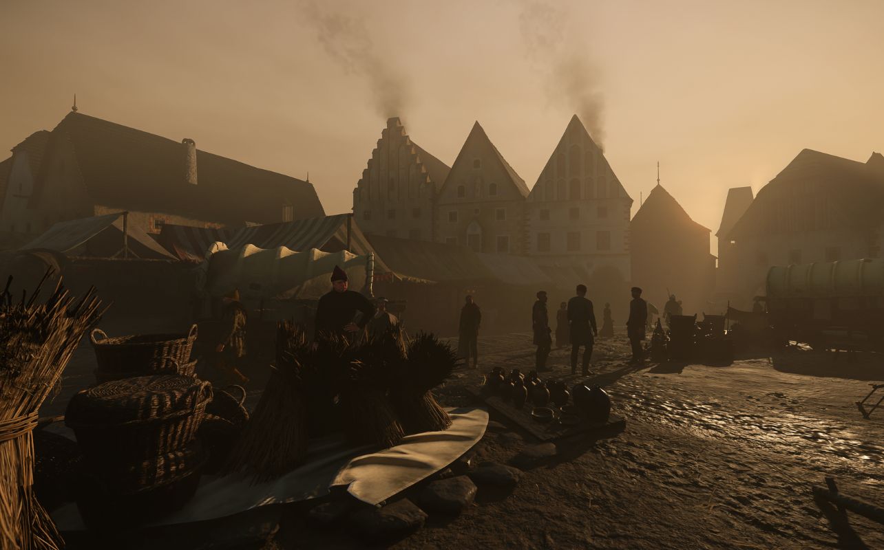 A screenshot of the video game Kingdom Come Deliverance II shows a medieval village at dusk.