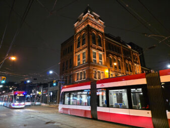 Samsung Galaxy S25 Ultra photo of streetcar with building.