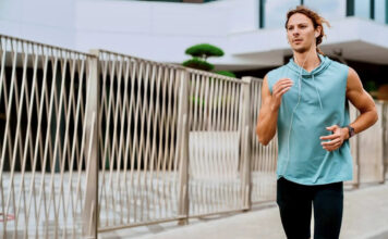 a man running while wearng the Amazfit Active