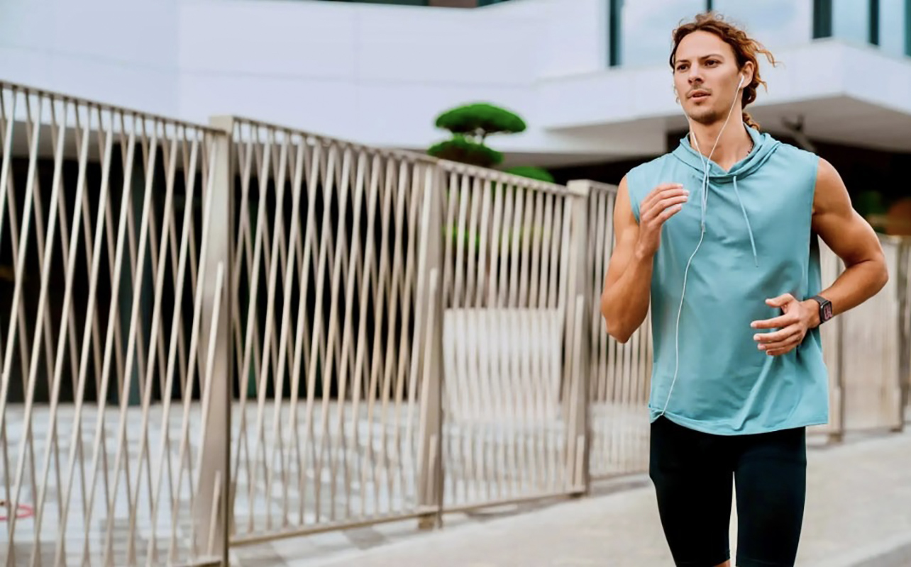 a man running while wearng the Amazfit Active