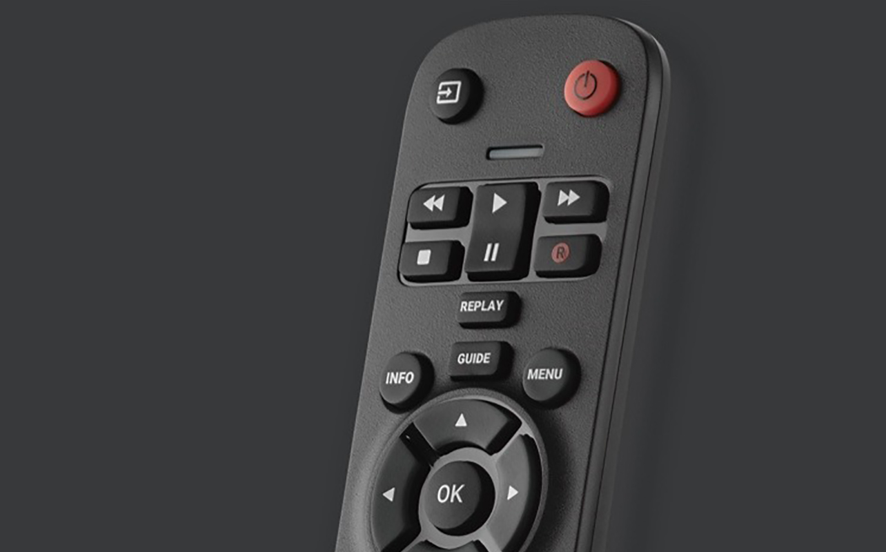 The top half of a One For All universal remote on a grey background.