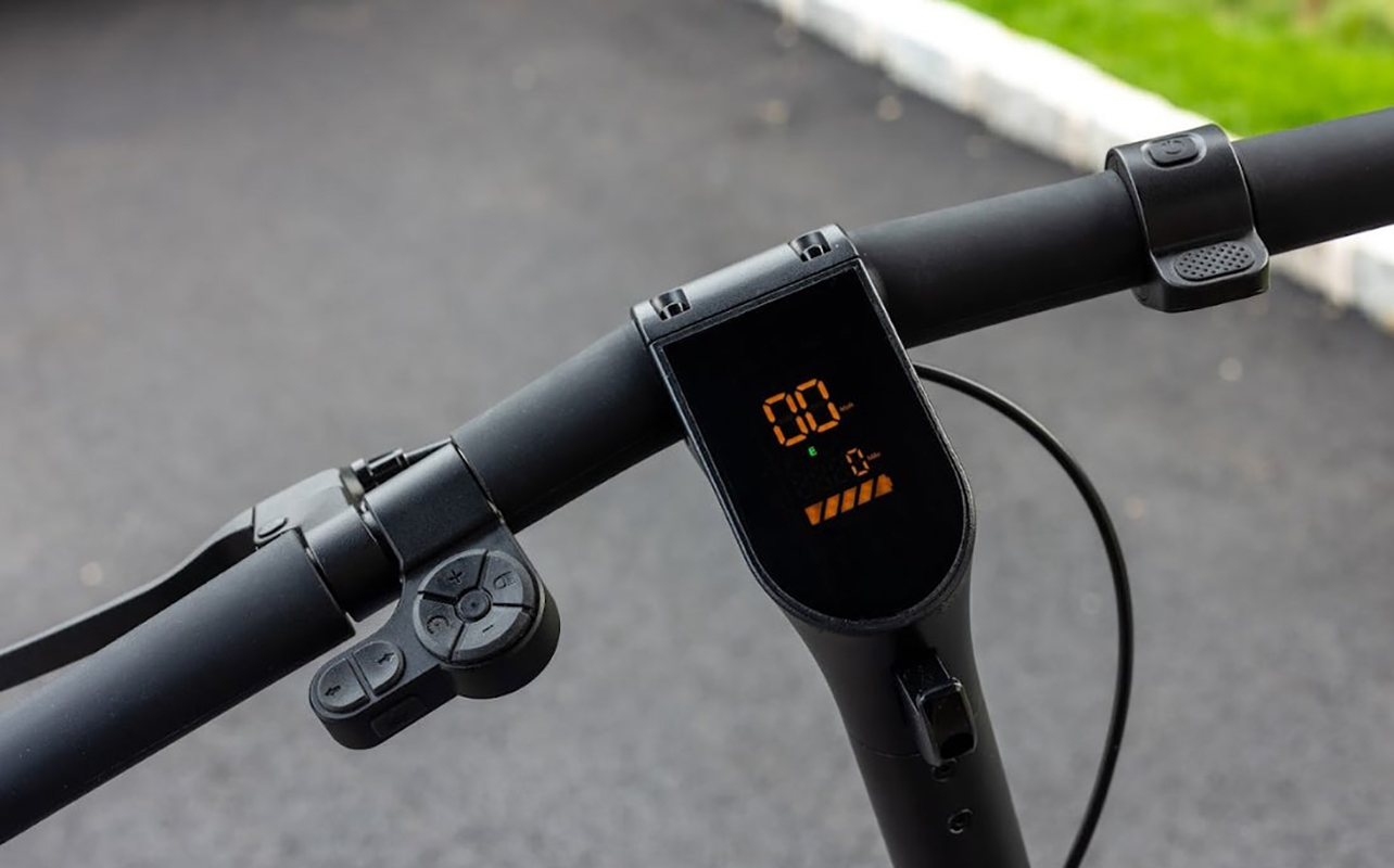 The handlebars and screen of the Swft EX9 electric scooter.