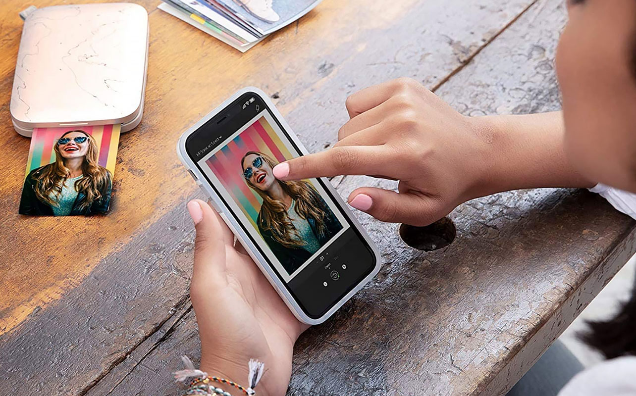 Imprimez instantanément vos meilleures photos de votre téléphone mobile sur une imprimante photo portative.