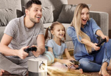 A family playing games on a Vankyo x3 projector.