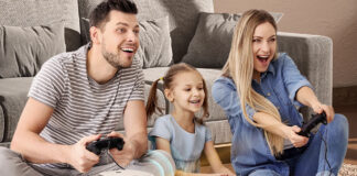 A family playing games on a Vankyo x3 projector.