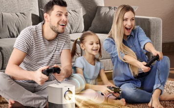 A family playing games on a Vankyo x3 projector.