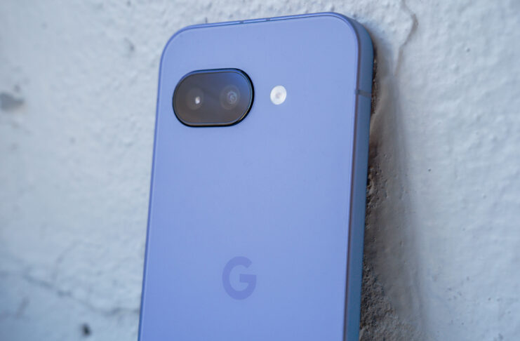 Back of Google Pixel 9a leaning on a ledge.