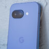Back of Google Pixel 9a leaning on a ledge.