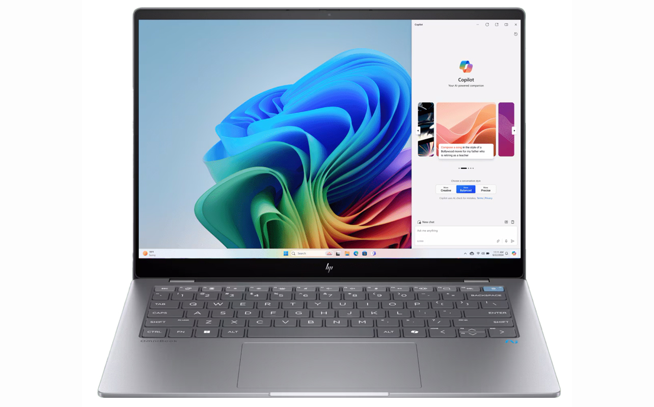 HP AI laptop showing Copilot+ onscreen.