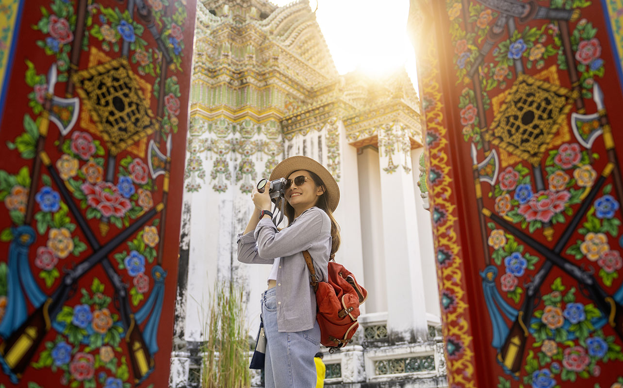 Take beautiful travel photos. Consider lighting, composition, and highlighting a story.
