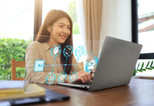 Woman using AI laptop with graphics showing what's possible.