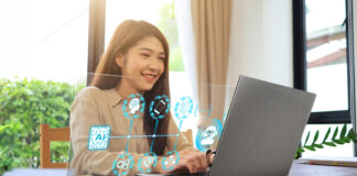 Woman using AI laptop with graphics showing what's possible.